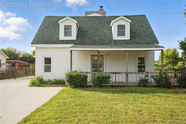 420 Wellsboro St, Walled Lake, MI 48390 - cape cod-style house with covered porch and a shingled roof