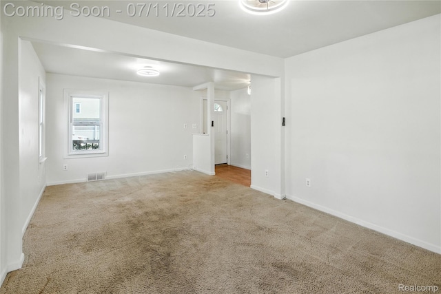 420 Wellsboro St, Walled Lake, MI 48390 - carpeted spare room featuring baseboards
