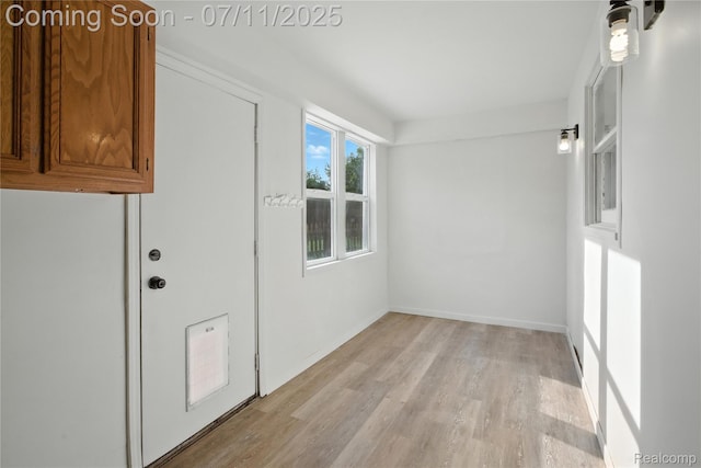 420 Wellsboro St, Walled Lake, MI 48390 - spare room featuring light wood-style floors and baseboards