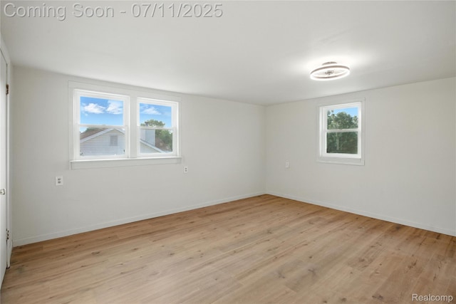 420 Wellsboro St, Walled Lake, MI 48390 - unfurnished room with light wood-style floors