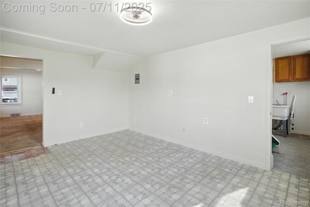 420 Wellsboro St, Walled Lake, MI 48390 - empty room featuring a sink and baseboards