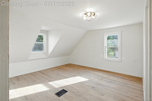 420 Wellsboro St, Walled Lake, MI 48390 - bonus room with plenty of natural light, wood finished floors, and vaulted ceiling