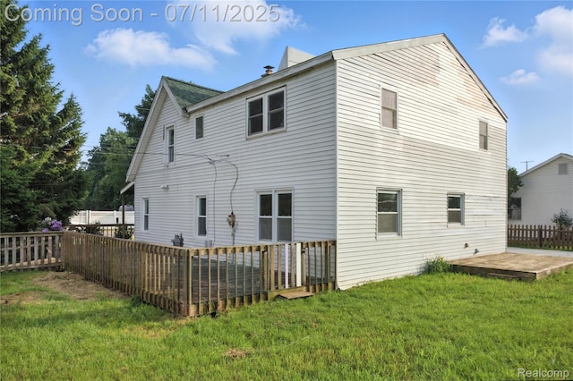 420 Wellsboro St, Walled Lake, MI 48390 - rear view of property with a deck