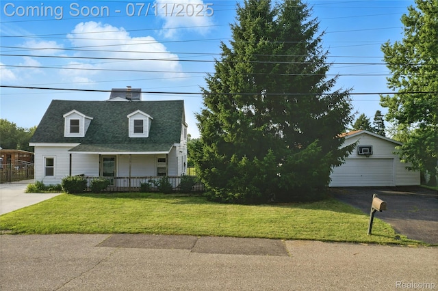 420 Wellsboro St, Walled Lake, MI 48390 - cape cod house with an outdoor structure, a shingled roof, a porch, and a front lawn