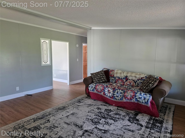 4605 Pleasant St, Clifford, MI 48727 - living area featuring wood finished floors, ornamental molding, and a textured ceiling