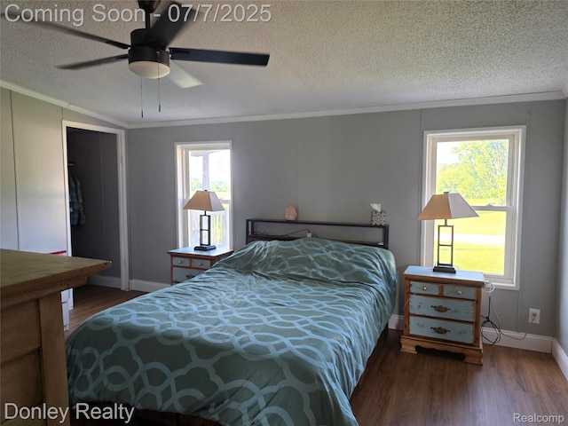 4605 Pleasant St, Clifford, MI 48727 - bedroom with wood finished floors, a textured ceiling, crown molding, and ceiling fan