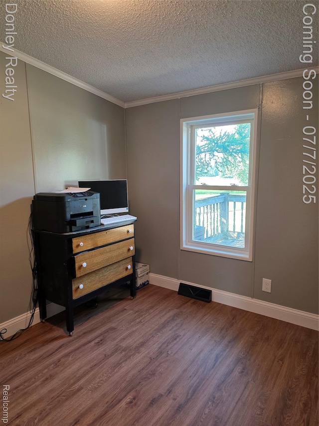 4605 Pleasant St, Clifford, MI 48727 - home office with ornamental molding, a textured ceiling, and wood finished floors