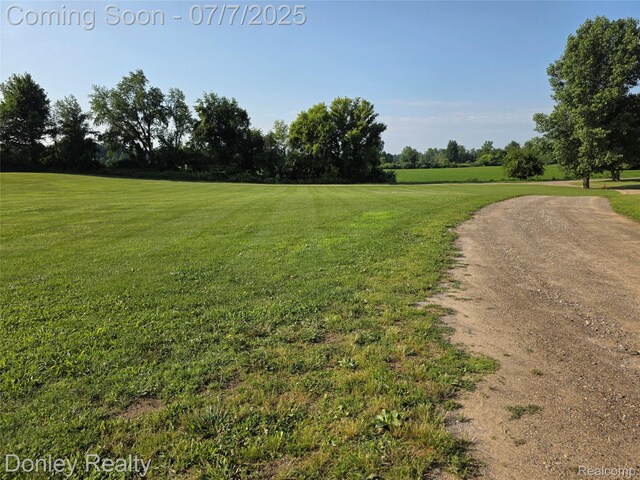 4605 Pleasant St, Clifford, MI 48727 - view of green lawn