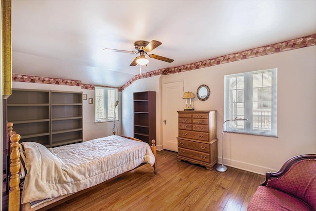 927 Kensington Ave, Flint, MI 48503 - bedroom with wood finished floors and a ceiling fan