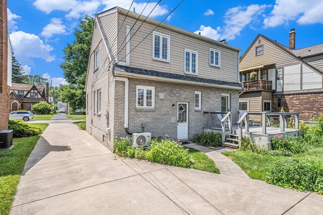 927 Kensington Ave, Flint, MI 48503 - view of front facade with brick siding