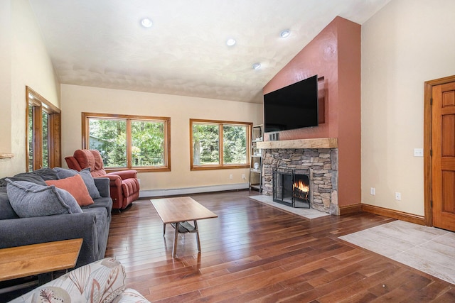 14814 Stone Jug Rd, Battle Creek, MI 49015 - living room featuring a baseboard radiator, plenty of natural light, hardwood / wood-style floors, high vaulted ceiling, and recessed lighting