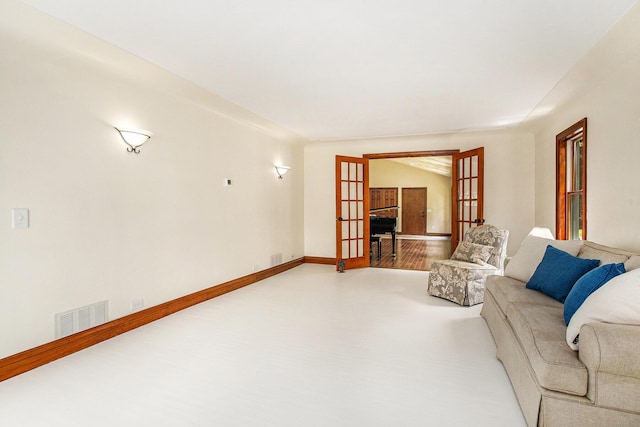 14814 Stone Jug Rd, Battle Creek, MI 49015 - living room featuring french doors and baseboards