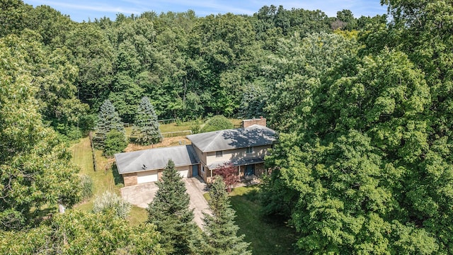 8257 S 2nd St, Michigan, MI 49071 - aerial view of property and surrounding area with a heavily wooded area