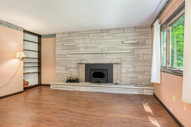 8257 S 2nd St, Michigan, MI 49071 - unfurnished living room with a textured ceiling and wood finished floors