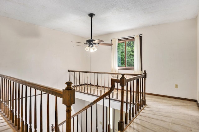 8257 S 2nd St, Michigan, MI 49071 - stairs with a ceiling fan and a textured ceiling