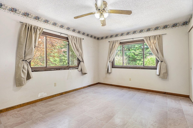 8257 S 2nd St, Michigan, MI 49071 - unfurnished room with a textured ceiling and ceiling fan