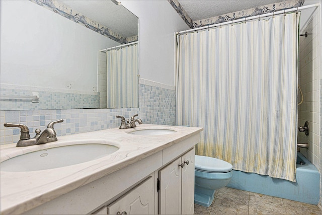 8257 S 2nd St, Michigan, MI 49071 - bathroom featuring shower / bathtub combination with curtain, double vanity, and a textured ceiling