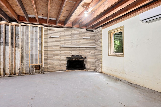 8257 S 2nd St, Michigan, MI 49071 - below grade area featuring an AC wall unit and a brick fireplace
