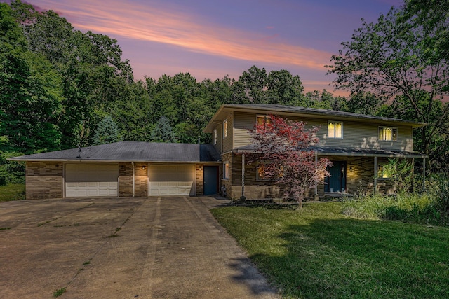 8257 S 2nd St, Michigan, MI 49071 - traditional-style home with driveway, a garage, and a yard