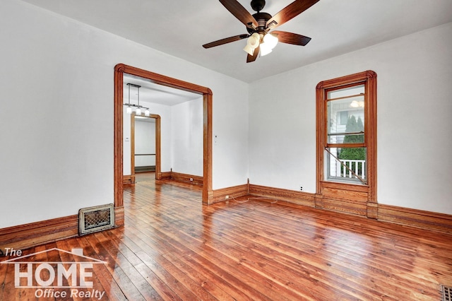 1114 Lynn St, Owosso, MI 48867 - unfurnished room with hardwood / wood-style flooring and a ceiling fan