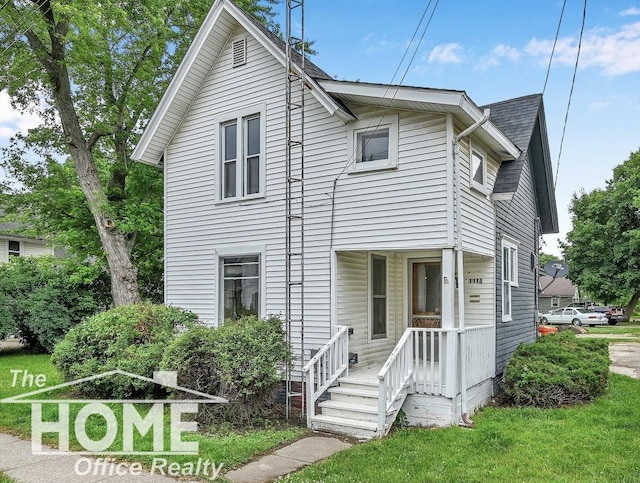 1114 Lynn St, Owosso, MI 48867 - view of front of house with covered porch