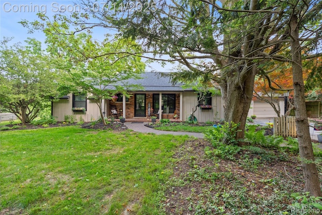 1300 N Livernois Rd, Rochester Hills, MI 48306 - view of front of property with a shingled roof and brick siding