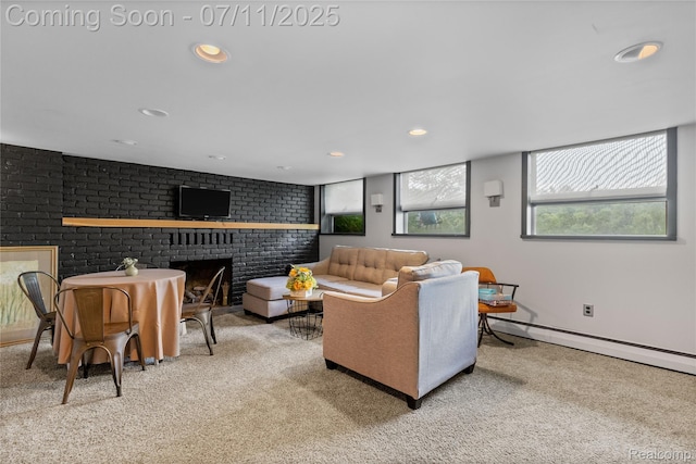1300 N Livernois Rd, Rochester Hills, MI 48306 - carpeted living room featuring a brick fireplace, a baseboard heating unit, and recessed lighting