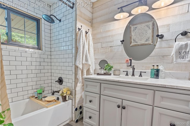 1300 N Livernois Rd, Rochester Hills, MI 48306 - full bathroom with vanity, tile walls, and washtub / shower combination