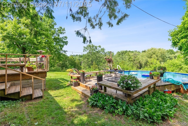 1300 N Livernois Rd, Rochester Hills, MI 48306 - view of grassy yard with a wooden deck and an outdoor pool
