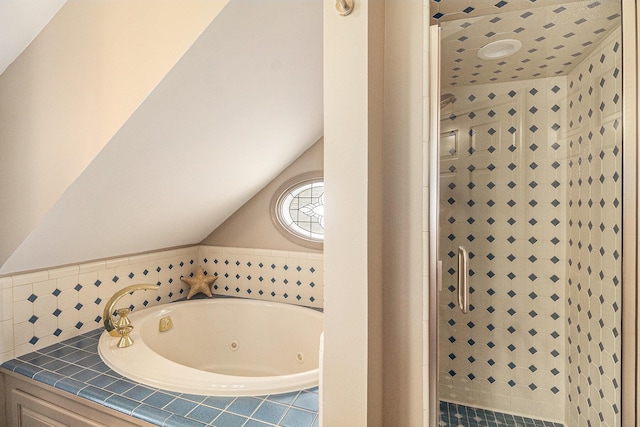 9991 Kaiser Rd, Saline, MI 48176 - bathroom featuring a shower stall, a jetted tub, and vaulted ceiling