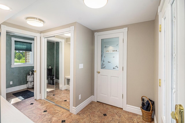 9991 Kaiser Rd, Saline, MI 48176 - foyer featuring baseboards