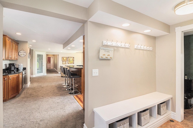 9991 Kaiser Rd, Saline, MI 48176 - mudroom with recessed lighting, a bar, and light colored carpet