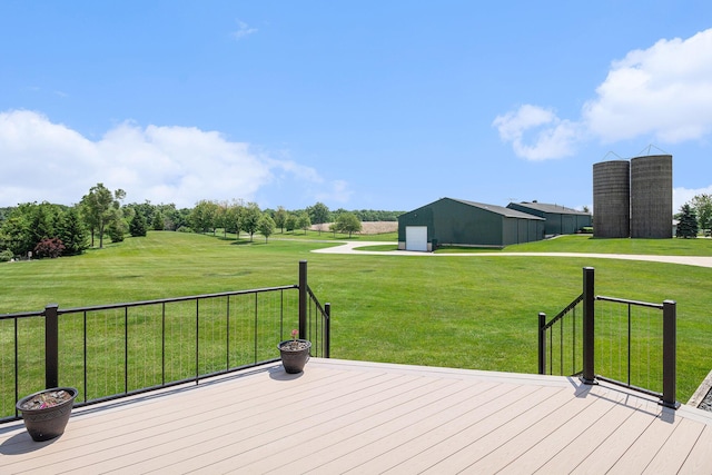 9991 Kaiser Rd, Saline, MI 48176 - deck with a detached garage and a lawn