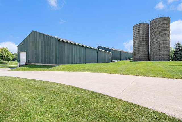9991 Kaiser Rd, Saline, MI 48176 - view of pole building featuring a lawn