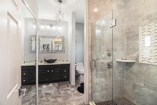 9991 Kaiser Rd, Saline, MI 48176 - full bathroom with double vanity, a shower stall, and marble finish flooring