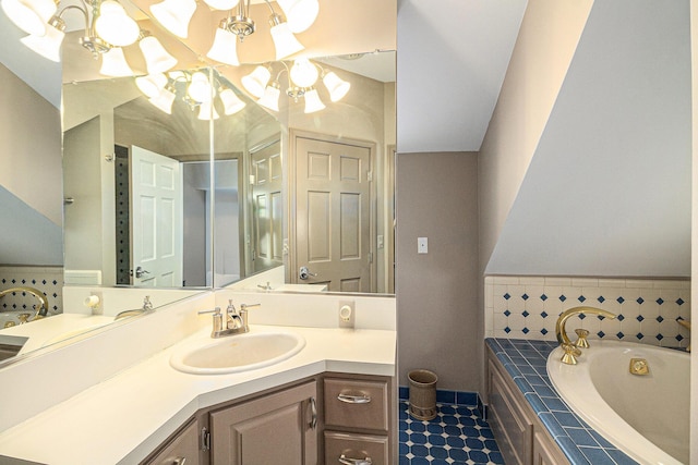 9991 Kaiser Rd, Saline, MI 48176 - full bath featuring a bath, vanity, and a chandelier