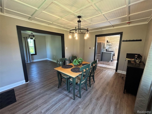 1295 S M 33, West Branch, MI 48661 - dining space with a chandelier and dark wood finished floors