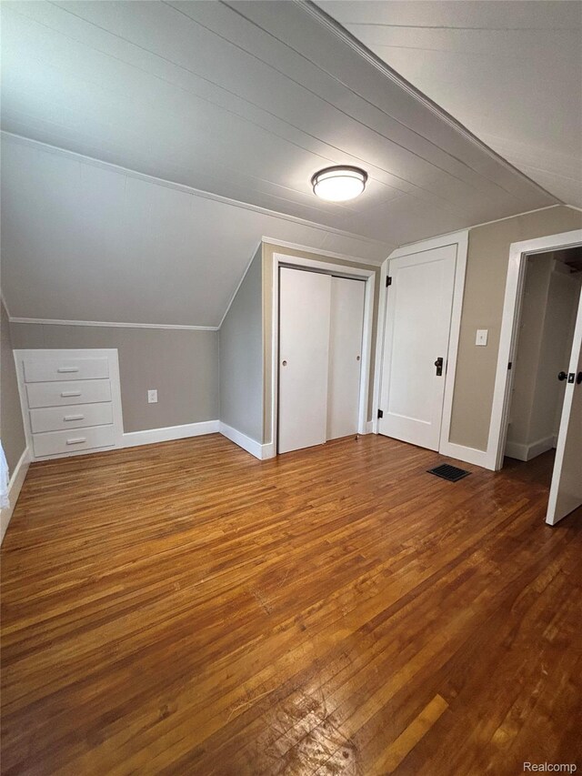 1295 S M 33, West Branch, MI 48661 - bonus room with wood finished floors and lofted ceiling