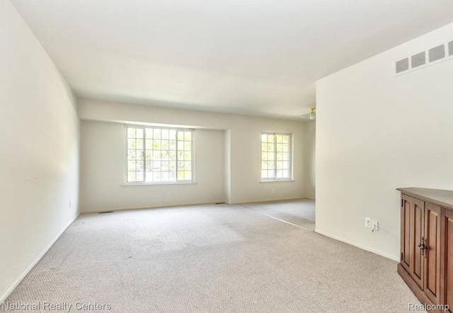 30260 Southfield Rd, Southfield, MI 48076 - spare room with healthy amount of natural light and light colored carpet