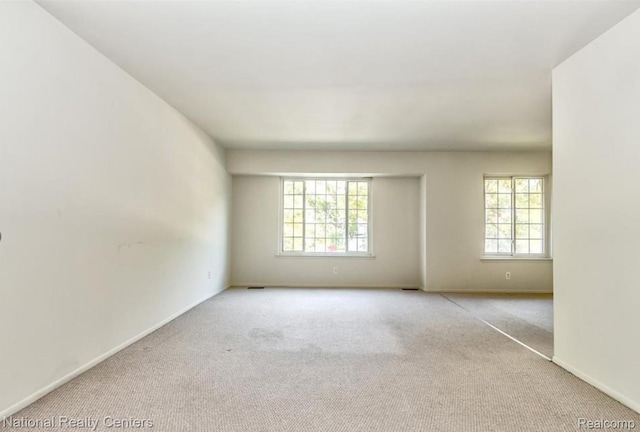 30260 Southfield Rd, Southfield, MI 48076 - carpeted spare room with healthy amount of natural light