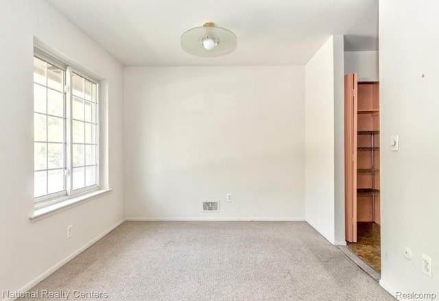 30260 Southfield Rd, Southfield, MI 48076 - carpeted empty room with baseboards