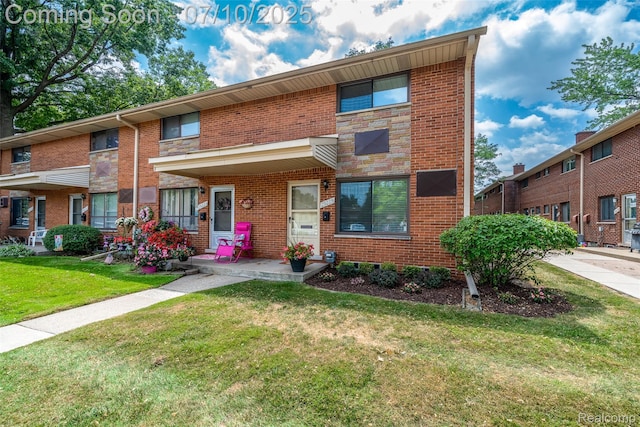 29225 Tessmer Ct, Madison Heights, MI 48071 - view of property featuring a front yard and brick siding