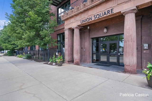 600 Broadway Ave NW Unit 124, Grand Rapids, MI 49504 - doorway to property with french doors