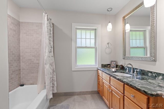 144 N Scott St, Adrian, MI 49221 - bathroom with tile patterned floors, vanity, and shower / tub combo with curtain
