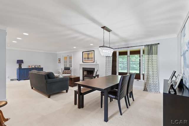 144 N Scott St, Adrian, MI 49221 - dining area with a fireplace, light colored carpet, and recessed lighting