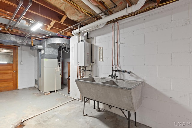 144 N Scott St, Adrian, MI 49221 - unfinished below grade area with water heater and heating unit