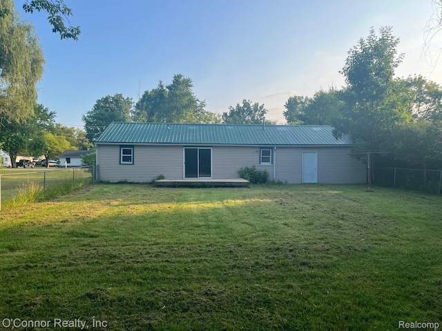 5035 Burma Rd, Kimball, MI 48074 - rear view of property with a fenced backyard and a metal roof