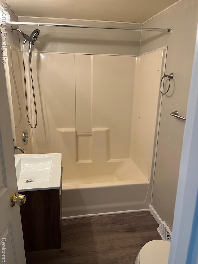 5035 Burma Rd, Kimball, MI 48074 - full bathroom featuring wood finished floors, shower / bathtub combination, and vanity