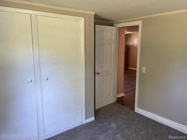5035 Burma Rd, Kimball, MI 48074 - unfurnished bedroom featuring carpet, crown molding, and a closet