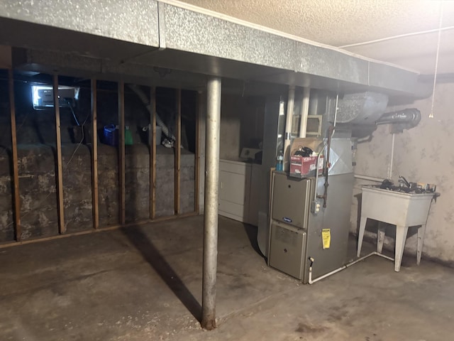 2233 Mc Ilwraith St, Muskegon Heights, MI 49444 - unfinished basement featuring washer and dryer and heating unit
